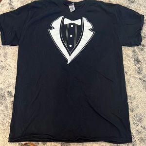 “Tuxedo” shirt. Mens medium. 100% cotton. Color is black with white decoration.